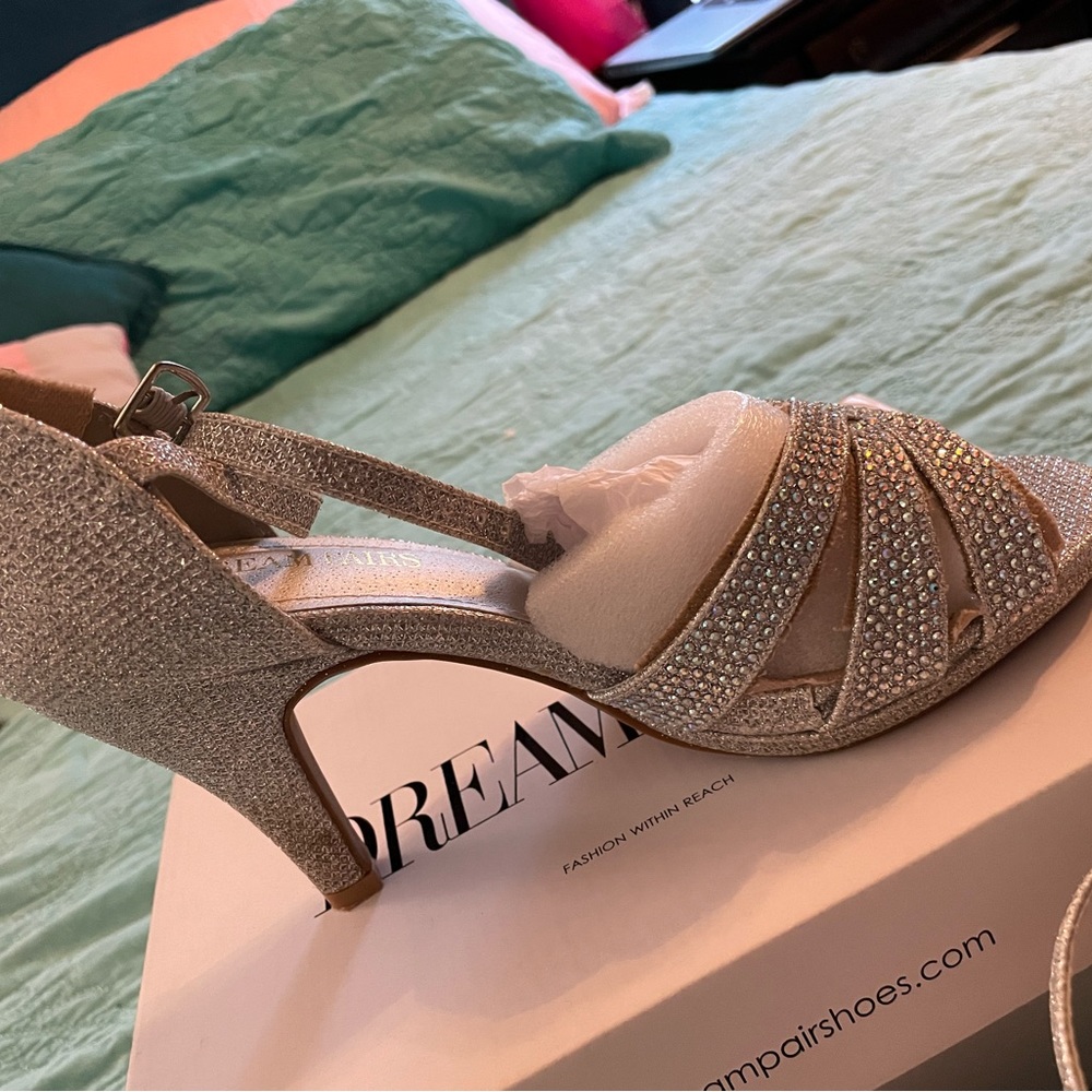 Silver formal heels and clutch purse. Shoes are size 7